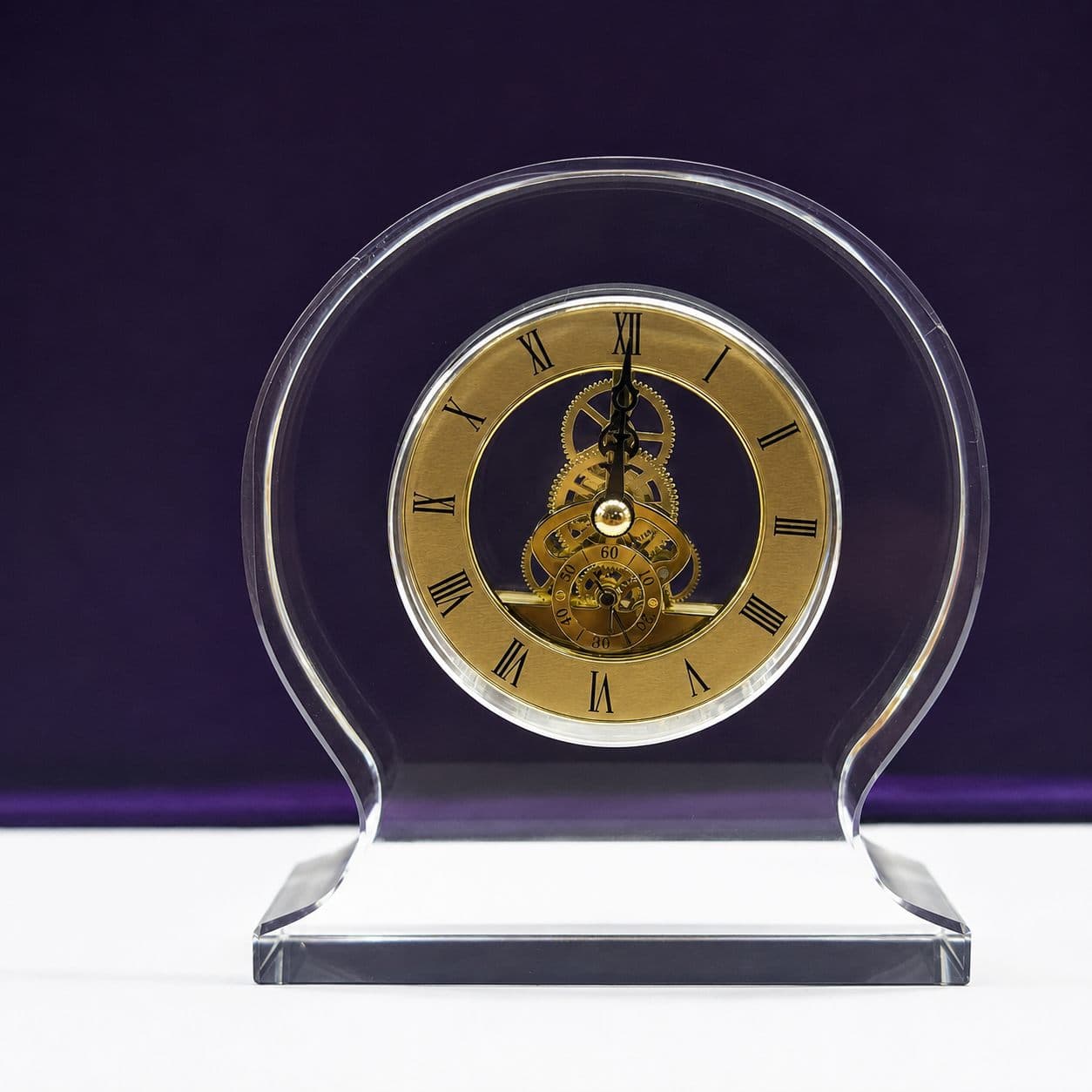 Meridian Arch Skeleton Clock — Optical crystal & brass